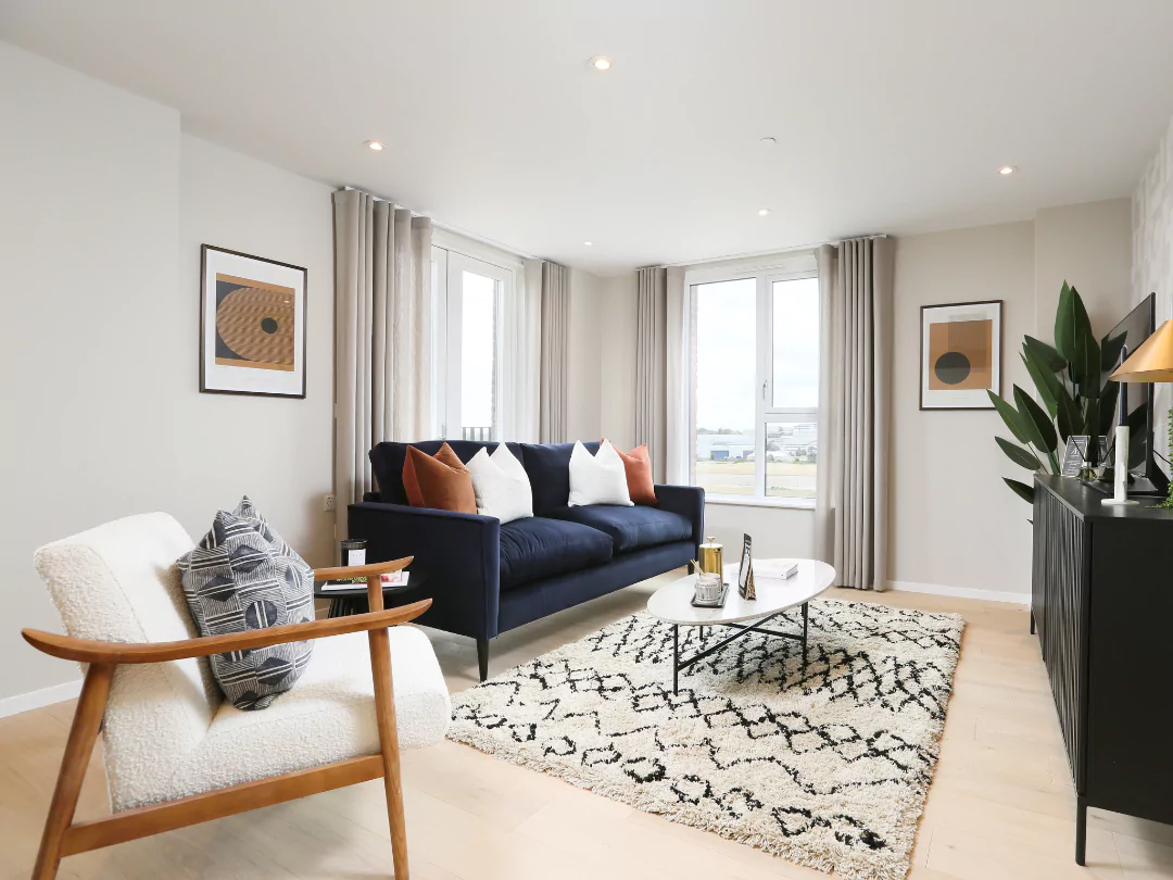 Light and airy styled living space featuring neutral decor.